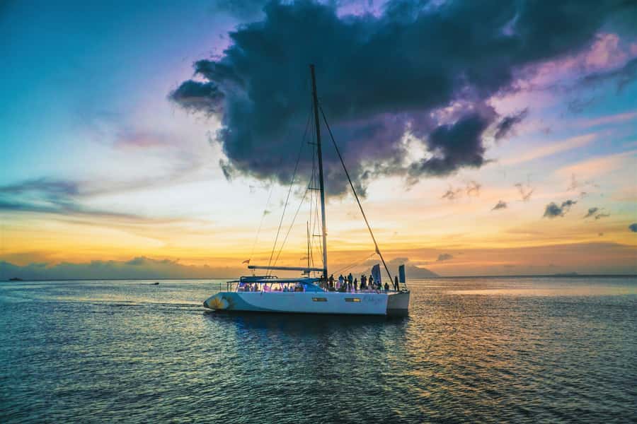 From Mahé: Seychelles Sunset Cruise with Hotel Transfers - A sunset cruise with a social side